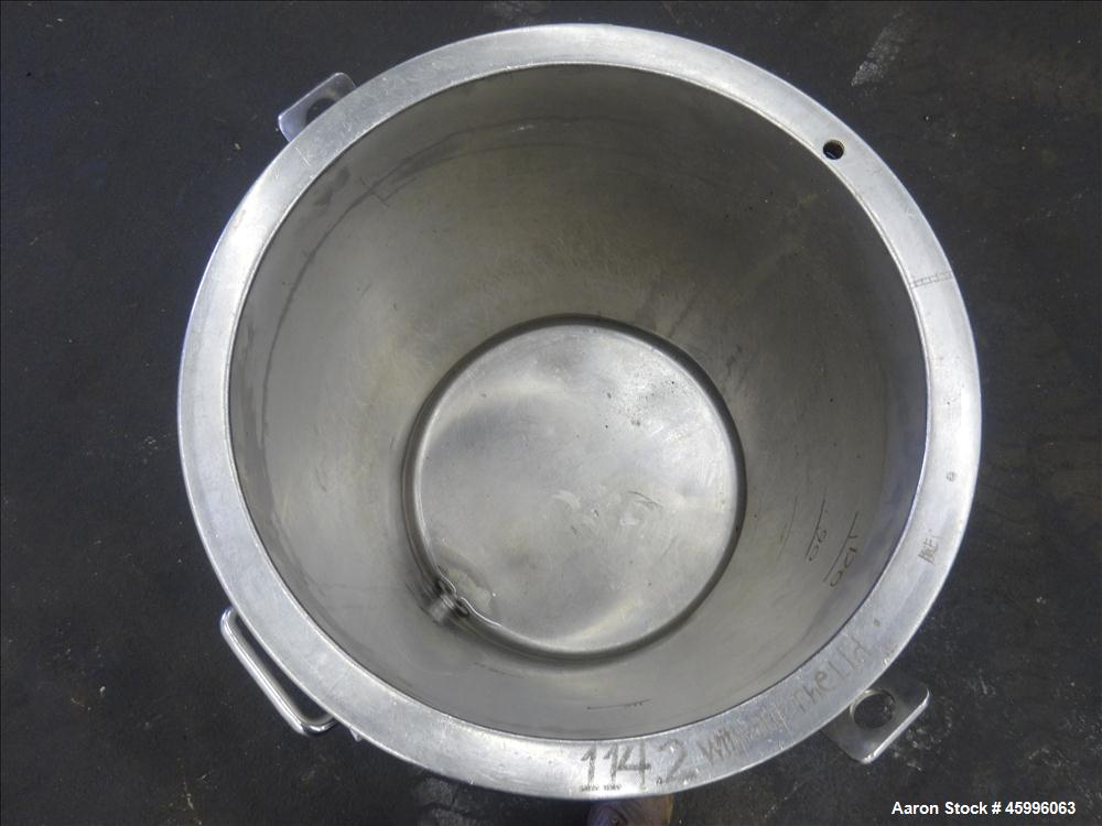 Used Tank, Approximate 30 Gallon, 304 Stainless Steel, Jacketed, Vertical. 20" diameter x 26" straight side. Pitched sloped bottom, open top, with a 2" side bottom outlet. Includes attached heating e...