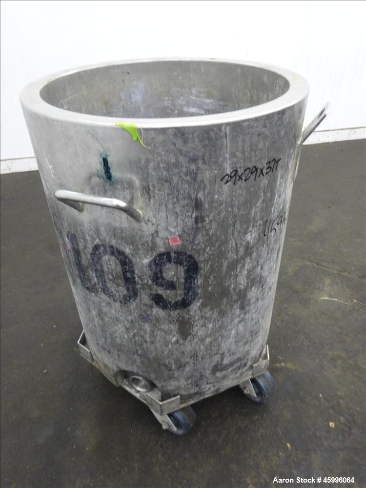 Used Tank, Approximate 30 Gallon, 304 Stainless Steel, Jacketed, Vertical. 20" diameter x 26" straight side. Pitched sloped bottom, open top, with a 2" side bottom outlet. Includes attached heating e...