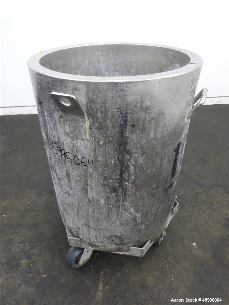 Used Tank, Approximate 30 Gallon, 304 Stainless Steel, Jacketed, Vertical. 20" diameter x 26" straight side. Pitched sloped bottom, open top, with a 2" side bottom outlet. Includes attached heating e...