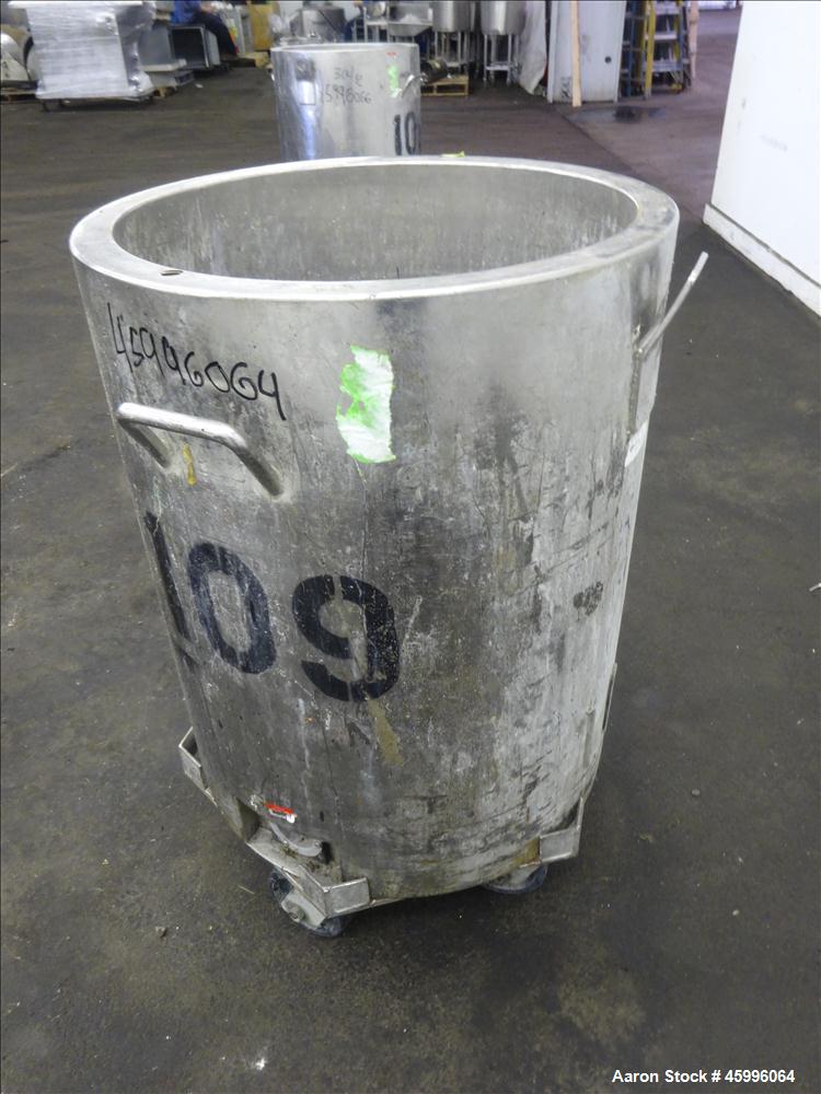 Used Tank, Approximate 30 Gallon, 304 Stainless Steel, Jacketed, Vertical. 20" diameter x 26" straight side. Pitched sloped bottom, open top, with a 2" side bottom outlet. Includes attached heating e...