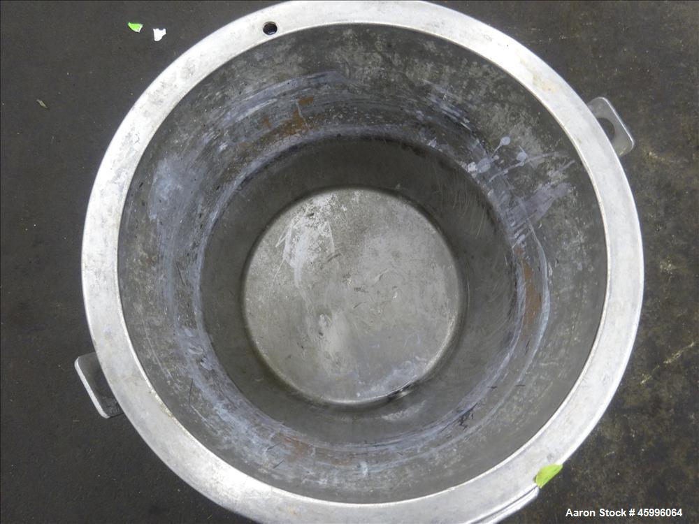 Used Tank, Approximate 30 Gallon, 304 Stainless Steel, Jacketed, Vertical. 20" diameter x 26" straight side. Pitched sloped bottom, open top, with a 2" side bottom outlet. Includes attached heating e...