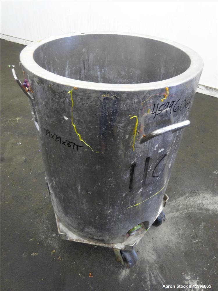 Used Tank, Approximate 30 Gallon, 304 Stainless Steel, Jacketed, Vertical. 20" diameter x 26" straight side. Pitched sloped bottom, open top, with a 2" side bottom outlet. Includes attached heating e...