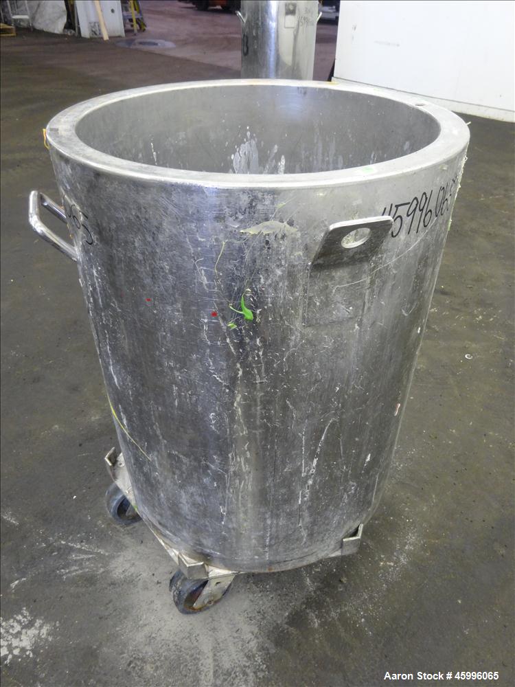 Used Tank, Approximate 30 Gallon, 304 Stainless Steel, Jacketed, Vertical. 20" diameter x 26" straight side. Pitched sloped bottom, open top, with a 2" side bottom outlet. Includes attached heating e...
