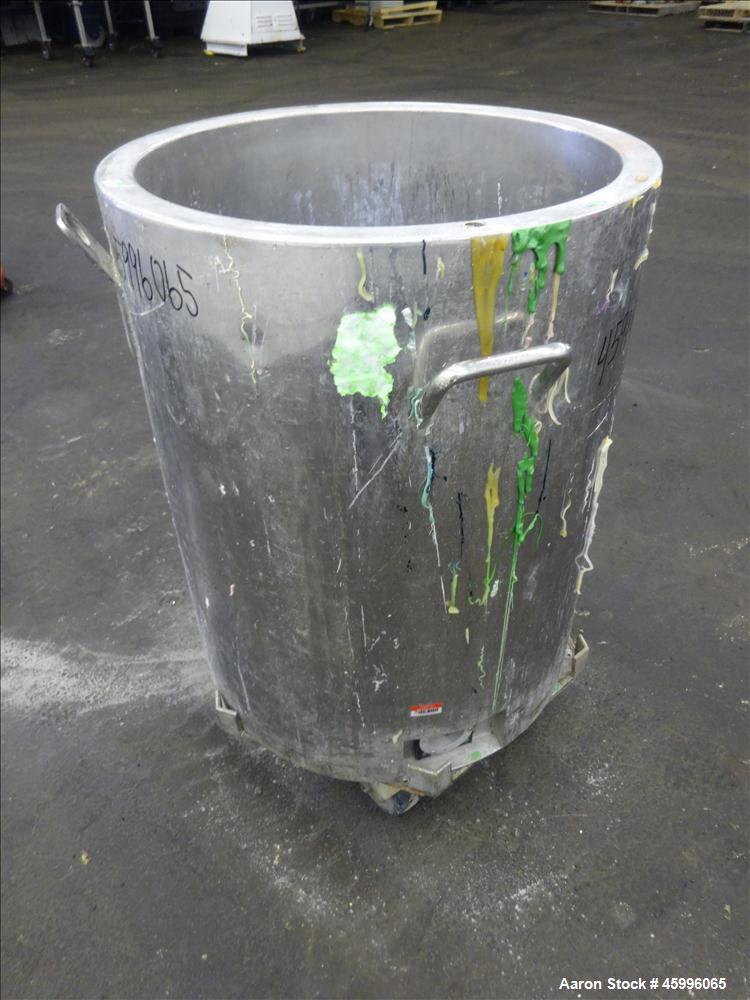 Used Tank, Approximate 30 Gallon, 304 Stainless Steel, Jacketed, Vertical. 20" diameter x 26" straight side. Pitched sloped bottom, open top, with a 2" side bottom outlet. Includes attached heating e...