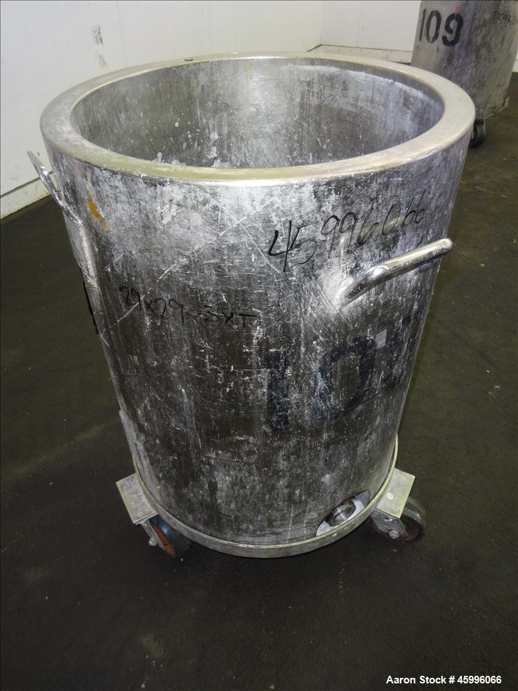 Used Tank, Approximate 30 Gallon, 304 Stainless Steel, Jacketed, Vertical. 20" diameter x 26" straight side. Pitched sloped bottom, open top, with a 2" side bottom outlet. Includes attached heating e...