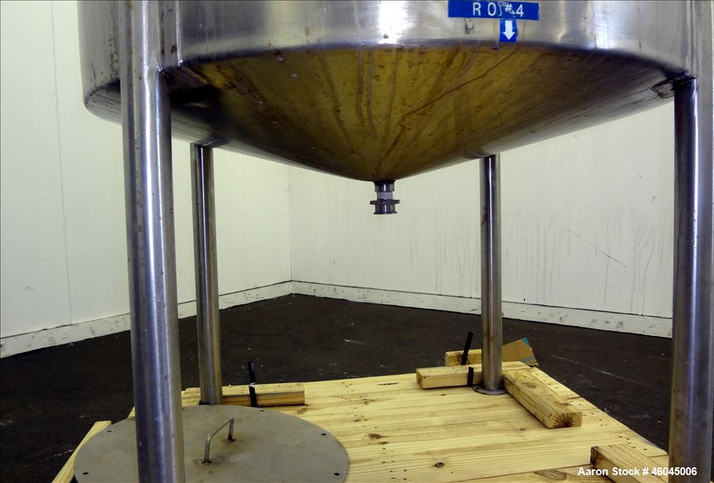 Used Tank, Approximate 330 Gallons, 304 Stainless Steel, Vertical. 45" diameter x 48" straight side, slight cone top, cone bottom. Top openings: 20" man way with cover, (3) 1" threaded, 2" threaded. ...