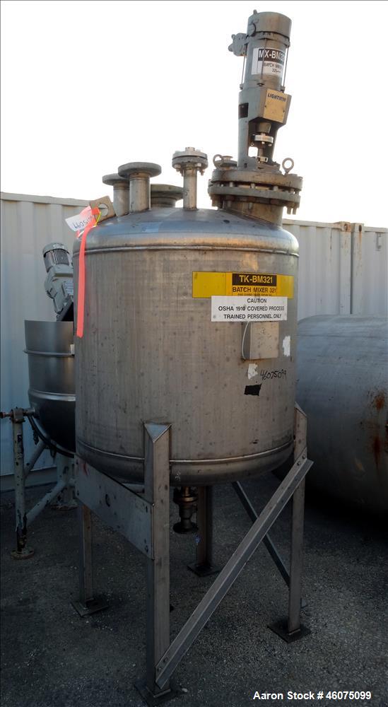 Used Tank, 225 Gallon, 304 Stainless Steel, Vertical. Approximate 42" diameter x 34" straight side, dished top & bottom. Off center top entering Lightnin agitator, model XJSS, serial# R0060117001. Ap...