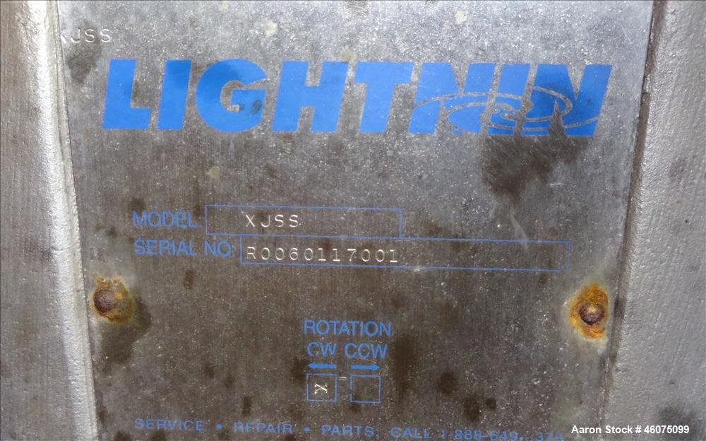 Used Tank, 225 Gallon, 304 Stainless Steel, Vertical. Approximate 42" diameter x 34" straight side, dished top & bottom. Off center top entering Lightnin agitator, model XJSS, serial# R0060117001. Ap...