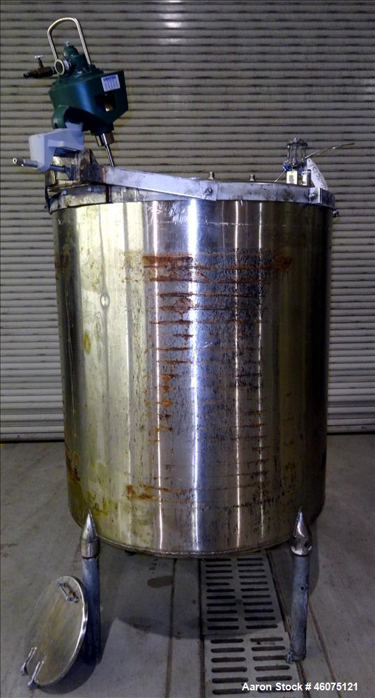Used Tank, Approximate 300 Gallon, 304 Stainless Steel, Vertical. Approximate 44" diameter x 50" straight side, flat top, coned bottom. Off center top entering air operated Lightnin agitator model X3...