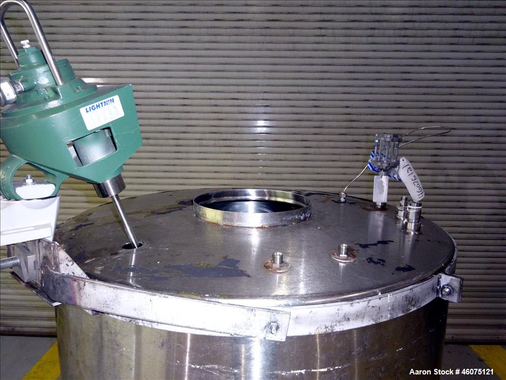 Used Tank, Approximate 300 Gallon, 304 Stainless Steel, Vertical. Approximate 44" diameter x 50" straight side, flat top, coned bottom. Off center top entering air operated Lightnin agitator model X3...