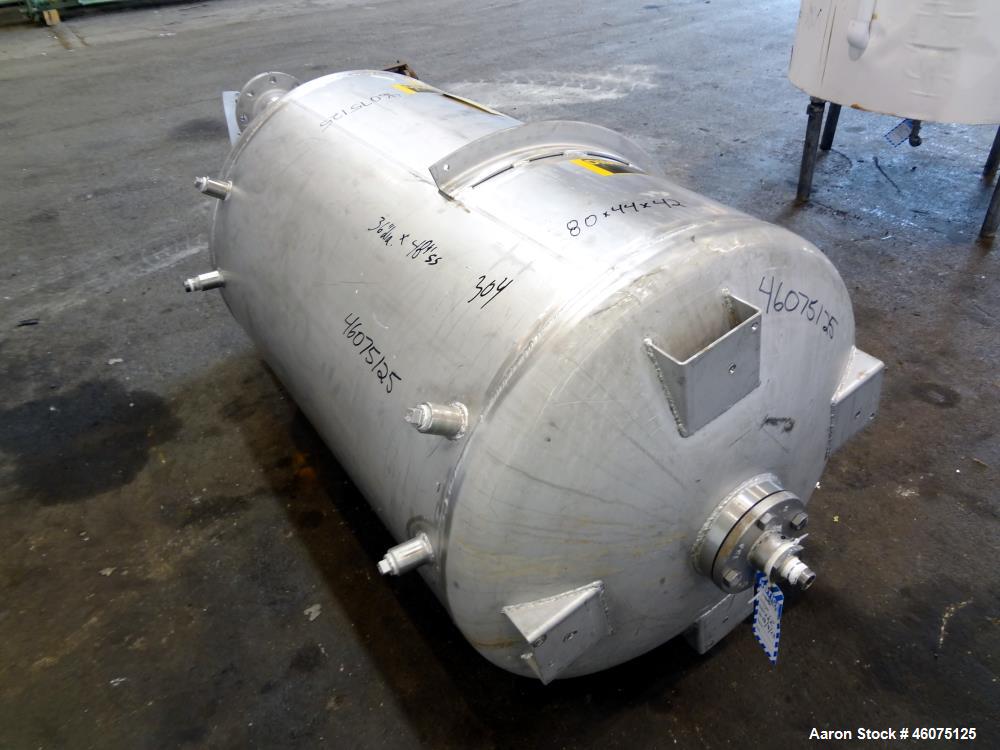 Used Tank, 225 Gallon, 304 Stainless Steel, Vertical. Approximate 36" diameter x 48" straight side, dished top & bottom. Top openings: 20" manway with cover, 8", 4", (2) 2", 1". 2" center bottom outl...