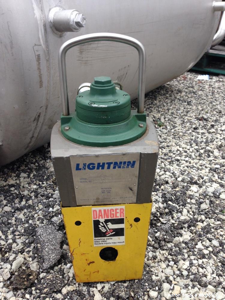 Used Tank, 225 Gallon, 304 Stainless Steel, Vertical. Approximate 36" diameter x 48" straight side, dished top & bottom. Lightnin air operated agitator model EKXJAC-33, serial# R0032770006. Shaft and...