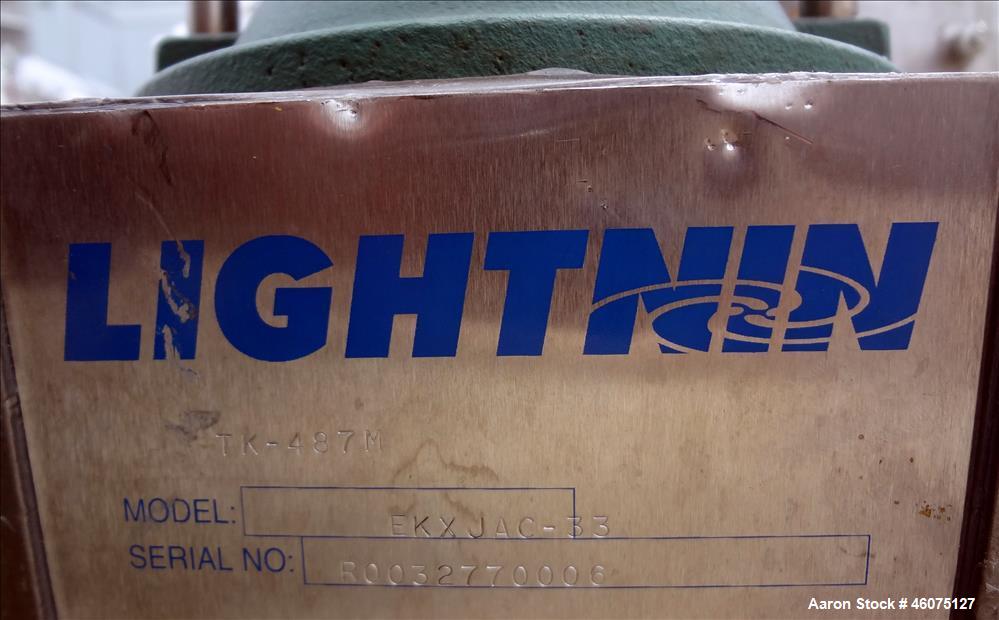 Used Tank, 225 Gallon, 304 Stainless Steel, Vertical. Approximate 36" diameter x 48" straight side, dished top & bottom. Lightnin air operated agitator model EKXJAC-33, serial# R0032770006. Shaft and...