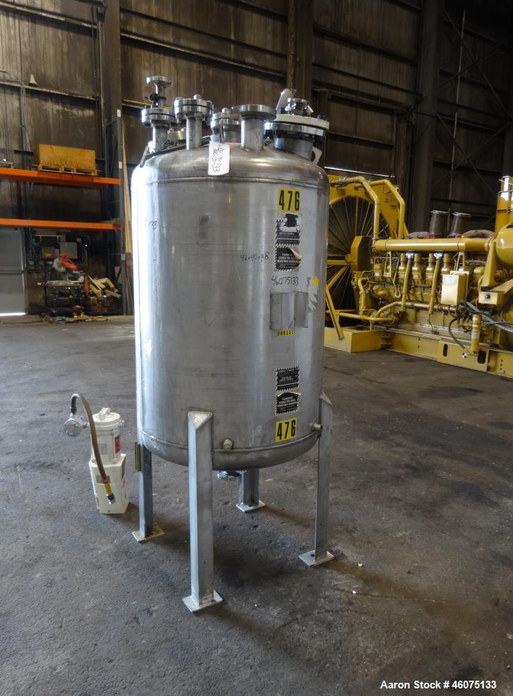 Used Tank, 200 Gallon, 316 Stainless Steel, Vertical. Approximate 36" diameter x 43" straight side, dished top & bottom. Off center top entering Lightnin agitator, model EKXJAC-43, serial# 93/B35832-...
