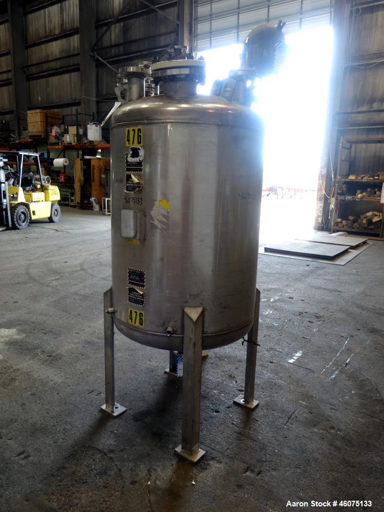 Used Tank, 200 Gallon, 316 Stainless Steel, Vertical. Approximate 36" diameter x 43" straight side, dished top & bottom. Off center top entering Lightnin agitator, model EKXJAC-43, serial# 93/B35832-...