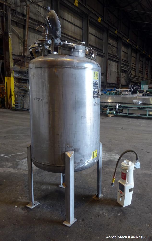 Used Tank, 200 Gallon, 316 Stainless Steel, Vertical. Approximate 36" diameter x 43" straight side, dished top & bottom. Off center top entering Lightnin agitator, model EKXJAC-43, serial# 93/B35832-...