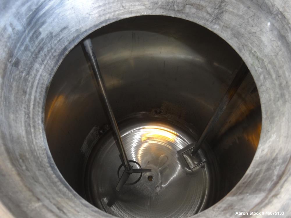 Used Tank, 200 Gallon, 316 Stainless Steel, Vertical. Approximate 36" diameter x 43" straight side, dished top & bottom. Off center top entering Lightnin agitator, model EKXJAC-43, serial# 93/B35832-...