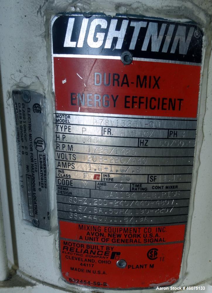 Used Tank, 200 Gallon, 316 Stainless Steel, Vertical. Approximate 36" diameter x 43" straight side, dished top & bottom. Off center top entering Lightnin agitator, model EKXJAC-43, serial# 93/B35832-...