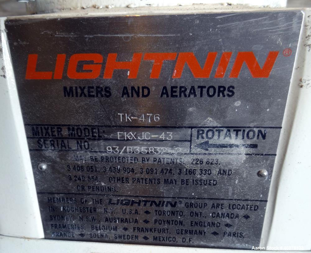 Used Tank, 200 Gallon, 316 Stainless Steel, Vertical. Approximate 36" diameter x 43" straight side, dished top & bottom. Off center top entering Lightnin agitator, model EKXJAC-43, serial# 93/B35832-...