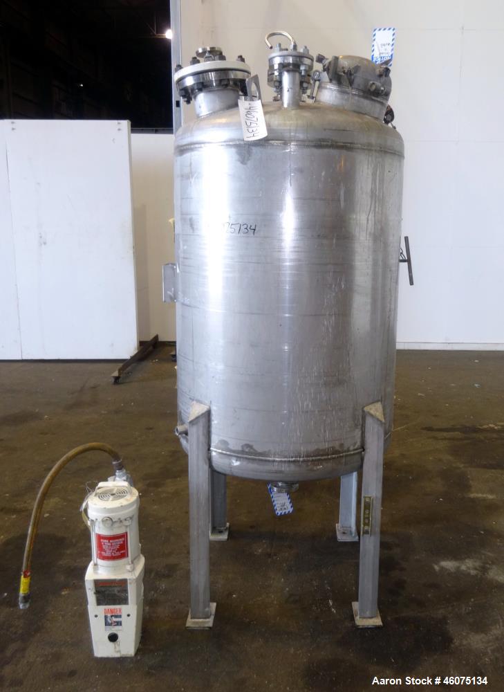 Used Tank, 200 Gallon, 316 Stainless Steel, Vertical. Approximate 36" diameter x 43" straight side, dished top & bottom. Off center top entering Lightnin agitator, model EKXJAC-43, serial# 93/B35832-...