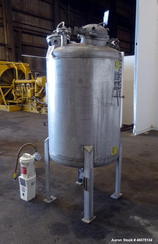 Used Tank, 200 Gallon, 316 Stainless Steel, Vertical. Approximate 36" diameter x 43" straight side, dished top & bottom. Off center top entering Lightnin agitator, model EKXJAC-43, serial# 93/B35832-...
