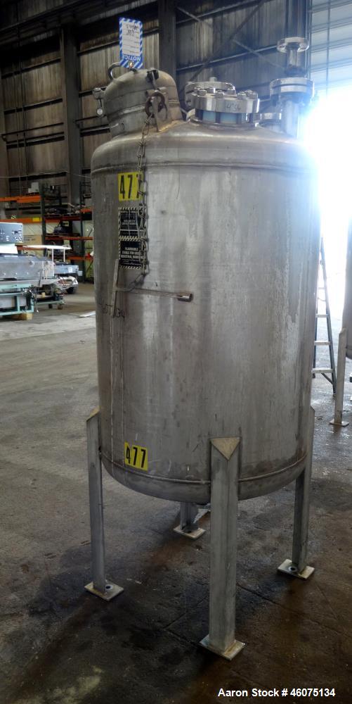 Used Tank, 200 Gallon, 316 Stainless Steel, Vertical. Approximate 36" diameter x 43" straight side, dished top & bottom. Off center top entering Lightnin agitator, model EKXJAC-43, serial# 93/B35832-...