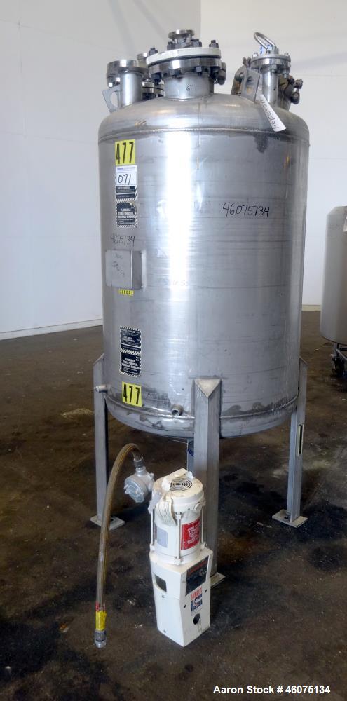 Used Tank, 200 Gallon, 316 Stainless Steel, Vertical. Approximate 36" diameter x 43" straight side, dished top & bottom. Off center top entering Lightnin agitator, model EKXJAC-43, serial# 93/B35832-...
