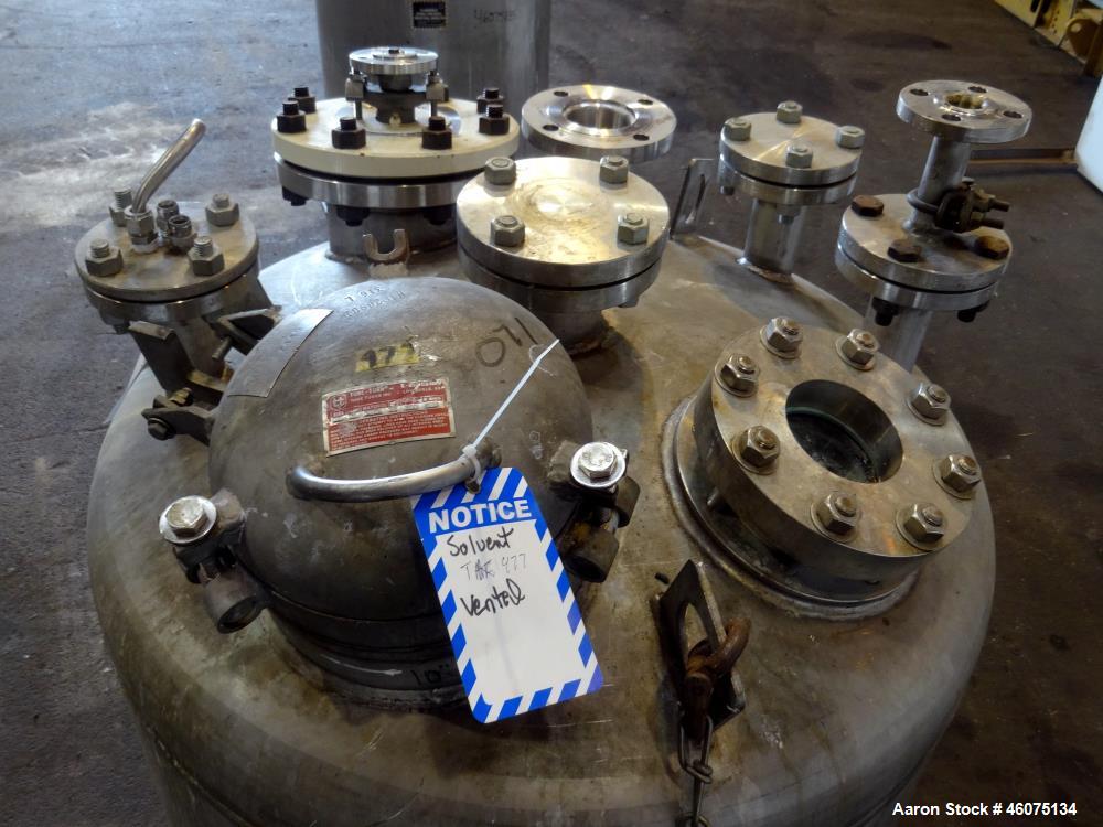 Used Tank, 200 Gallon, 316 Stainless Steel, Vertical. Approximate 36" diameter x 43" straight side, dished top & bottom. Off center top entering Lightnin agitator, model EKXJAC-43, serial# 93/B35832-...