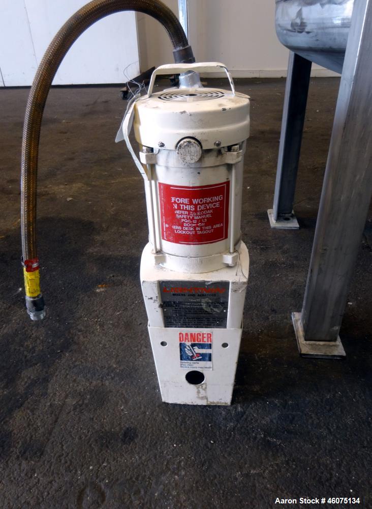 Used Tank, 200 Gallon, 316 Stainless Steel, Vertical. Approximate 36" diameter x 43" straight side, dished top & bottom. Off center top entering Lightnin agitator, model EKXJAC-43, serial# 93/B35832-...