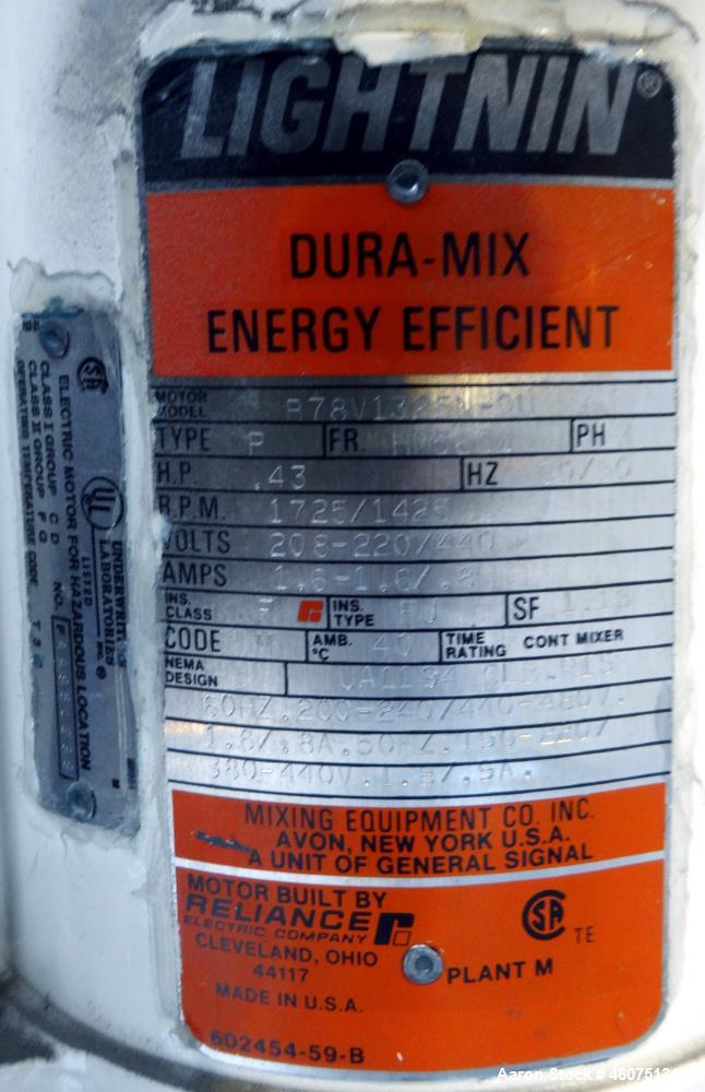 Used Tank, 200 Gallon, 316 Stainless Steel, Vertical. Approximate 36" diameter x 43" straight side, dished top & bottom. Off center top entering Lightnin agitator, model EKXJAC-43, serial# 93/B35832-...