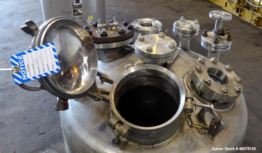 Used Tank, 200 Gallon, 316 Stainless Steel, Vertical. Approximate 36" diameter x 43" straight side, dished top & bottom. Off center top entering air operated Lightnin agitator, model N33AR-33, serial...