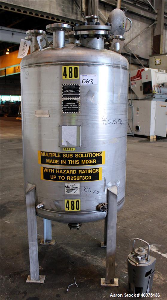 Used Tank, 200 Gallon, 316 Stainless Steel, Vertical. Approximate 36" diameter x 43" straight side, dished top & bottom. Off center top entering air operated Lightnin agitator, model EKXJAC-33, seria...