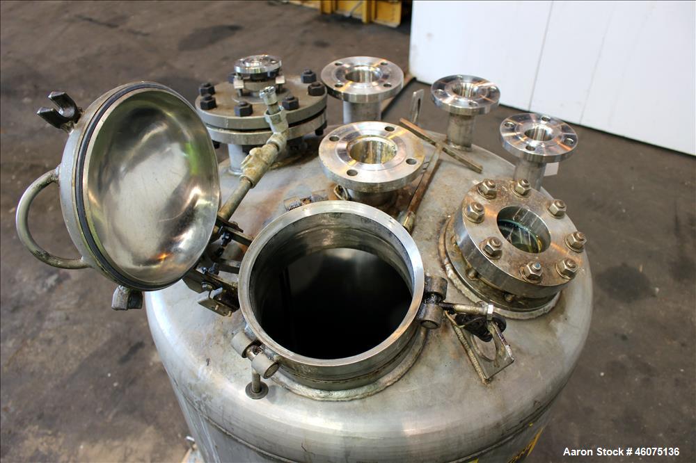 Used Tank, 200 Gallon, 316 Stainless Steel, Vertical. Approximate 36" diameter x 43" straight side, dished top & bottom. Off center top entering air operated Lightnin agitator, model EKXJAC-33, seria...