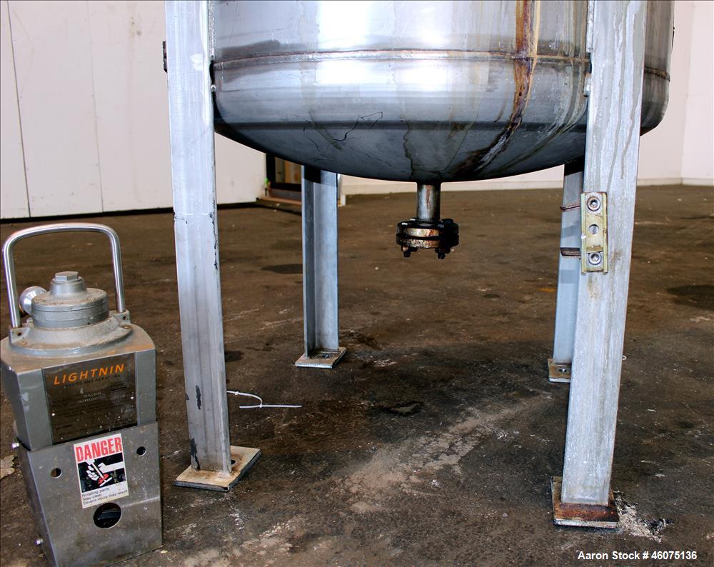 Used Tank, 200 Gallon, 316 Stainless Steel, Vertical. Approximate 36" diameter x 43" straight side, dished top & bottom. Off center top entering air operated Lightnin agitator, model EKXJAC-33, seria...