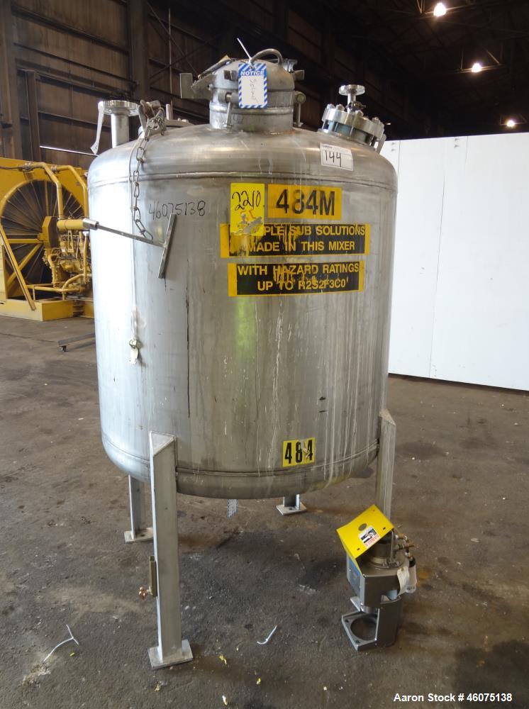 Used Tank, 325 Gallon, 316 Stainless Steel, Vertical. Approximate 48" diameter x 38" straight side, dished top & bottom. Off center top entering model EKXJC-65, serial# 93/B35821-01. 3 Blade turbine,...