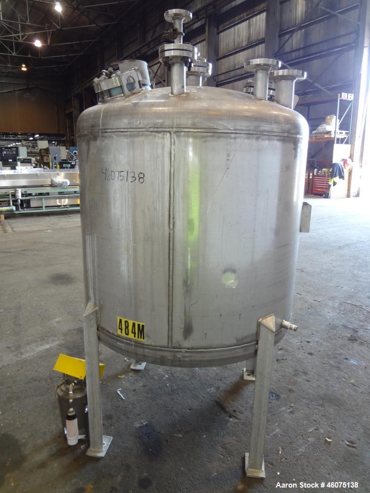 Used Tank, 325 Gallon, 316 Stainless Steel, Vertical. Approximate 48" diameter x 38" straight side, dished top & bottom. Off center top entering model EKXJC-65, serial# 93/B35821-01. 3 Blade turbine,...