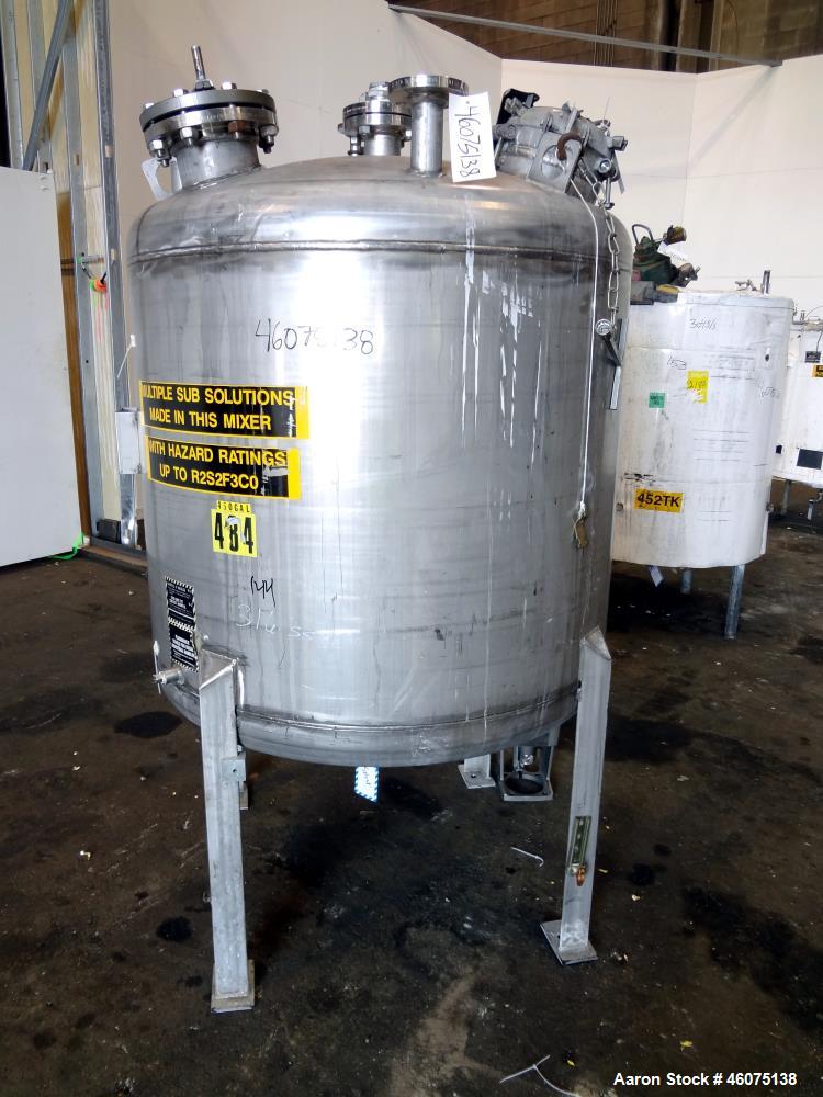 Used Tank, 325 Gallon, 316 Stainless Steel, Vertical. Approximate 48" diameter x 38" straight side, dished top & bottom. Off center top entering model EKXJC-65, serial# 93/B35821-01. 3 Blade turbine,...