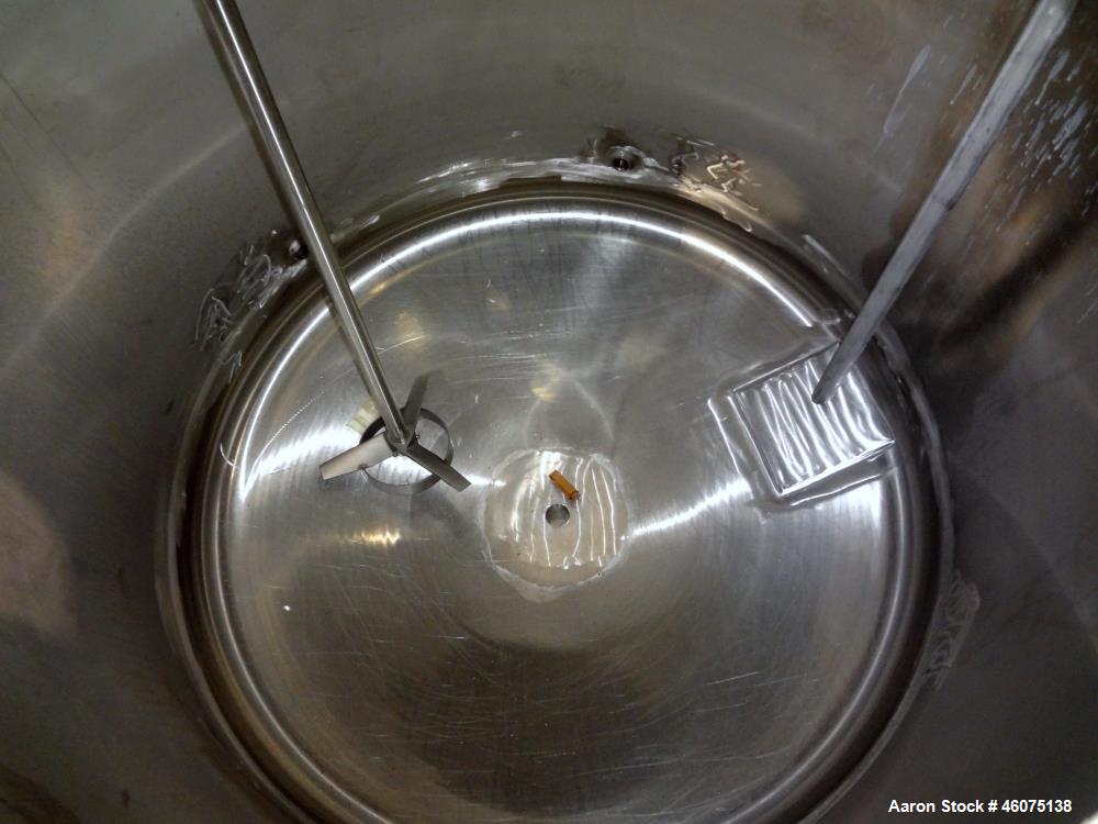 Used Tank, 325 Gallon, 316 Stainless Steel, Vertical. Approximate 48" diameter x 38" straight side, dished top & bottom. Off center top entering model EKXJC-65, serial# 93/B35821-01. 3 Blade turbine,...