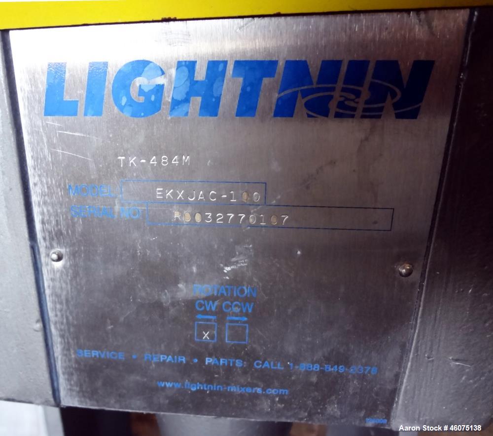 Used Tank, 325 Gallon, 316 Stainless Steel, Vertical. Approximate 48" diameter x 38" straight side, dished top & bottom. Off center top entering model EKXJC-65, serial# 93/B35821-01. 3 Blade turbine,...