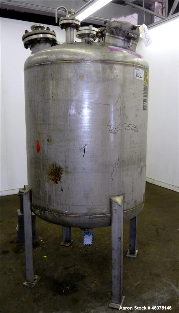 Used Tank, 275 Gallon, 316 Stainless Steel, Vertical. Approximate 42" diameter x 42" straight side, dished top & bottom. Off center top entering Lightnin agitator, model EKXJC-65, serial# 93/B35821-0...
