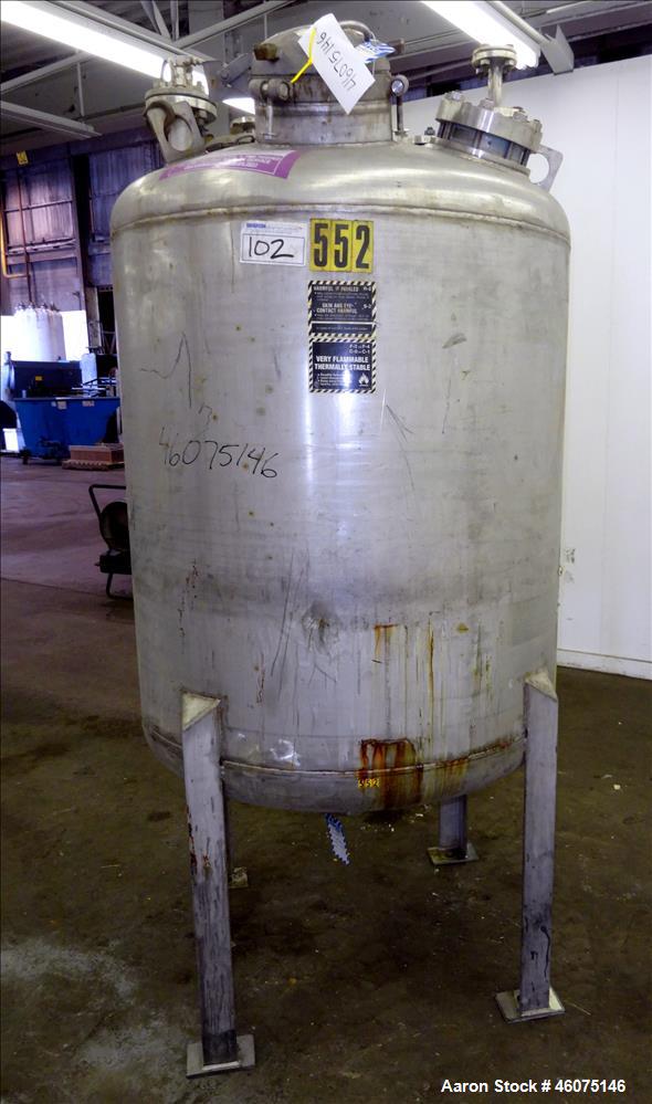 Used Tank, 275 Gallon, 316 Stainless Steel, Vertical. Approximate 42" diameter x 42" straight side, dished top & bottom. Off center top entering Lightnin agitator, model EKXJC-65, serial# 93/B35821-0...