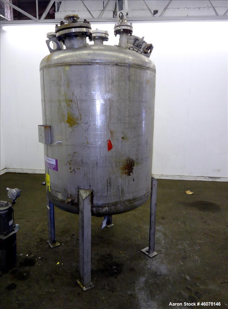 Used Tank, 275 Gallon, 316 Stainless Steel, Vertical. Approximate 42" diameter x 42" straight side, dished top & bottom. Off center top entering Lightnin agitator, model EKXJC-65, serial# 93/B35821-0...