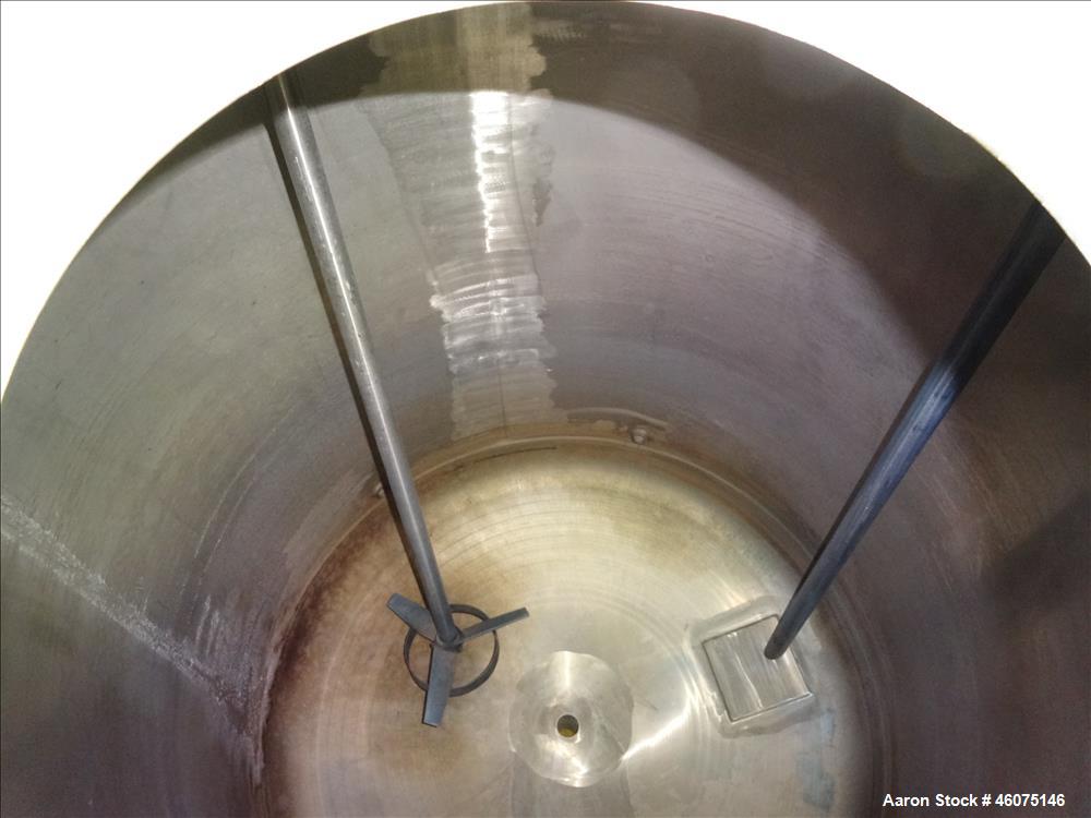 Used Tank, 275 Gallon, 316 Stainless Steel, Vertical. Approximate 42" diameter x 42" straight side, dished top & bottom. Off center top entering Lightnin agitator, model EKXJC-65, serial# 93/B35821-0...