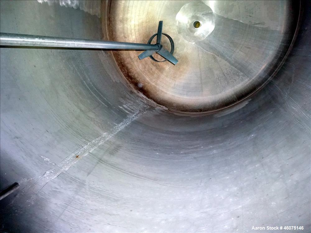 Used Tank, 275 Gallon, 316 Stainless Steel, Vertical. Approximate 42" diameter x 42" straight side, dished top & bottom. Off center top entering Lightnin agitator, model EKXJC-65, serial# 93/B35821-0...