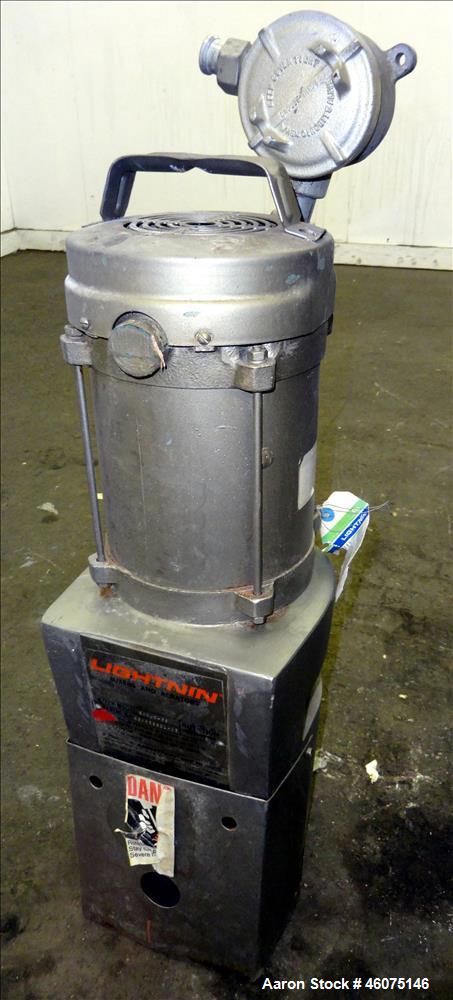 Used Tank, 275 Gallon, 316 Stainless Steel, Vertical. Approximate 42" diameter x 42" straight side, dished top & bottom. Off center top entering Lightnin agitator, model EKXJC-65, serial# 93/B35821-0...