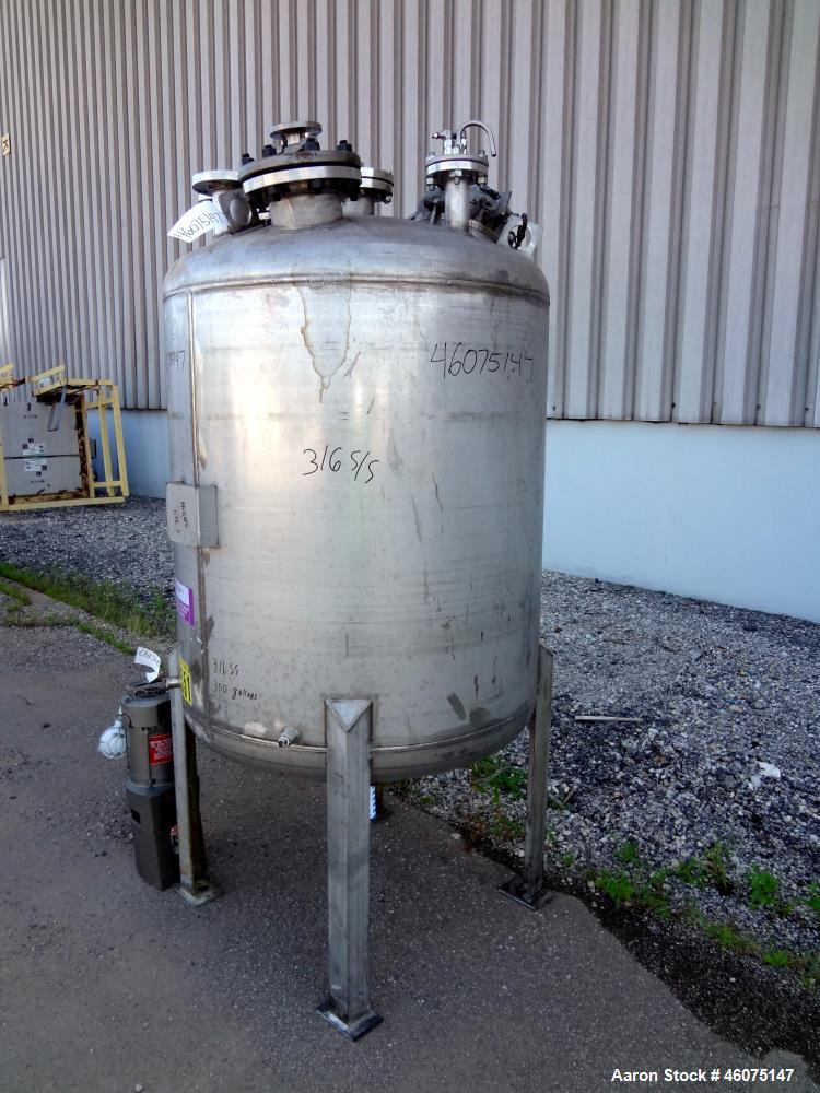 Used Tank, 275 Gallon, 316 Stainless Steel, Vertical. Approximate 42" diameter x 43" straight side, dished top & bottom. Off center top entering air operated Lightnin agitator, model EKXJAC-100, seri...