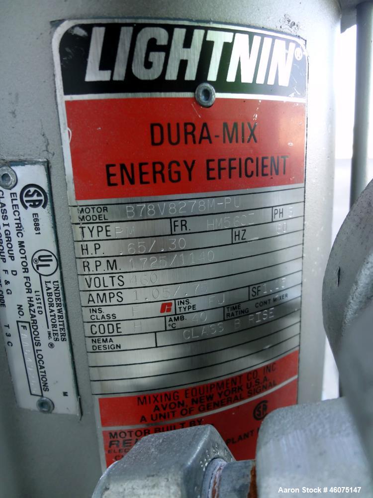 Used Tank, 275 Gallon, 316 Stainless Steel, Vertical. Approximate 42" diameter x 43" straight side, dished top & bottom. Off center top entering air operated Lightnin agitator, model EKXJAC-100, seri...