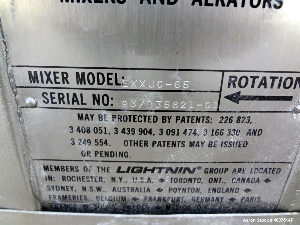 Used Tank, 275 Gallon, 316 Stainless Steel, Vertical. Approximate 42" diameter x 43" straight side, dished top & bottom. Off center top entering air operated Lightnin agitator, model EKXJAC-100, seri...