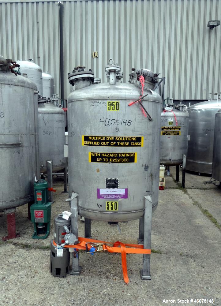 Used Tank, 275 Gallon, 316 Stainless Steel, Vertical. Approximate 42" diameter x 43" straight side, dished top & bottom. Off center top entering Lightnin agitator, model EKXJC-65, serial# 93/B35821-0...