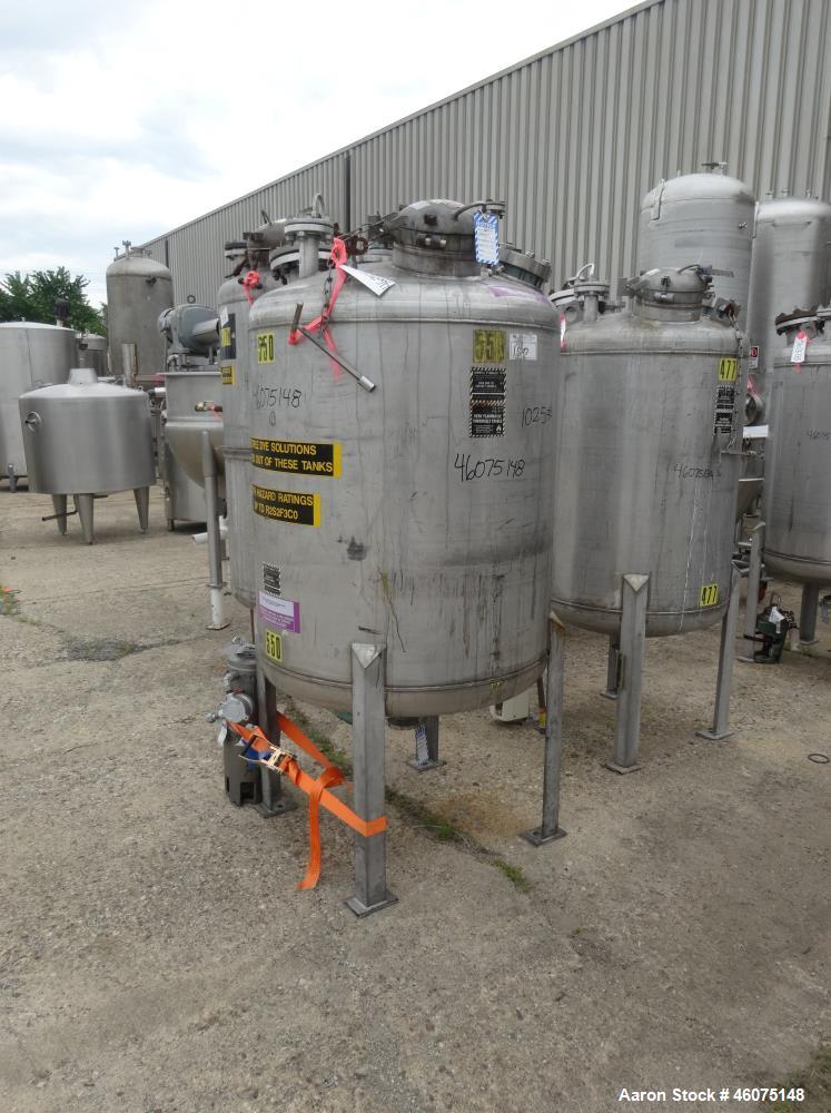 Used Tank, 275 Gallon, 316 Stainless Steel, Vertical. Approximate 42" diameter x 43" straight side, dished top & bottom. Off center top entering Lightnin agitator, model EKXJC-65, serial# 93/B35821-0...